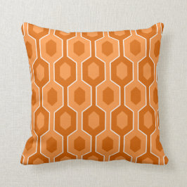 Modern sexhörningsdesign, orange och vit kudde