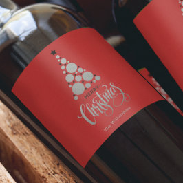 Modern silver julgran på röd vinflaska etikett