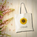 Modern solrossolrosBlommigt Rustic Tygkasse<br><div class="desc">Modern blommigt till väskan,  med en solrosblomma av rustisk gult. Med svart skriptskrivning kan du anpassa texten så att den blir ett tillbehör till underbar anpassningsbar. Perfekt för att hålla ihop dina saker när du är på språng.</div>