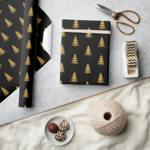 Modern svart julgran i guld presentpapper