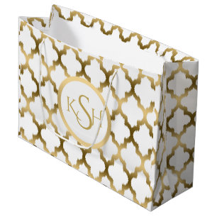 Modern vit och guld Ikat Quatrefoil-mönster