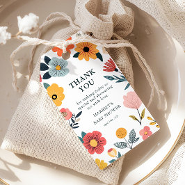 Moderna blomsterfavor för baby shower presentetikett