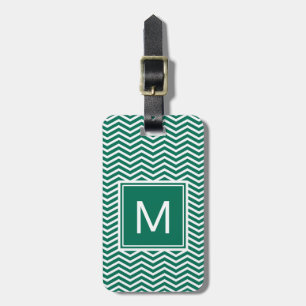 Moderna frodiga gröna sparrar med monogramen bagagebricka