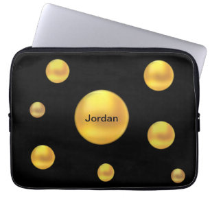 Moderna guldpunkter på svart laptop fodral