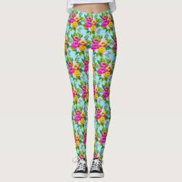 Moderna mångfärgade blommor på ljust blått leggings