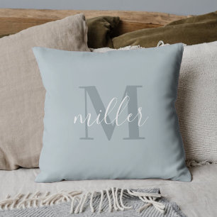 Modernt familjenamn monogram i blått kudde
