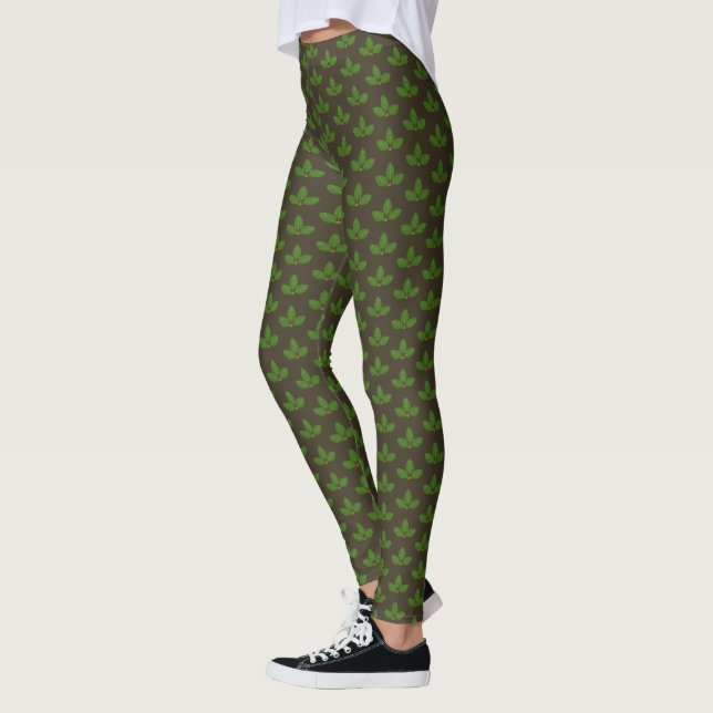 Modernt grönt lagerbladsmönster på brunt leggings (Vänster)