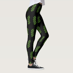 Modernt grönt lagerbladsmönster på svart leggings
