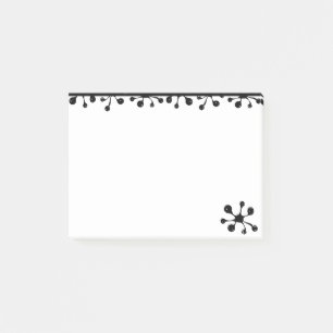 Modernt konstnärligt svart sprut på vitt post-it block