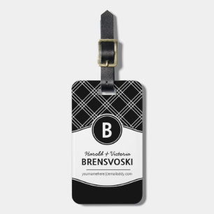 Modernt koppla ihop den svartvita monogramen bagagebricka