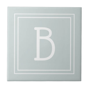 Modernt lantlighetsmonogram med grön och vit initi kakelplatta