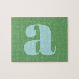 Modernt monogram initial bokstav blå och grön pussel
