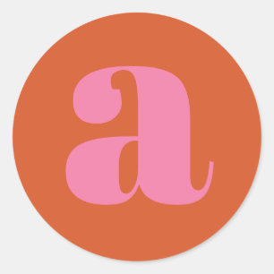 Modernt monogram initial bokstav rosa och orange runt klistermärke