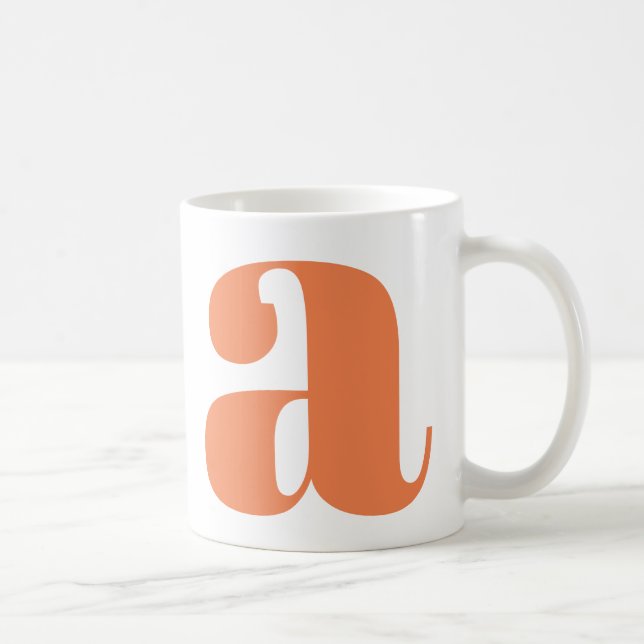 Modernt monogram initialbokstav i orange kaffemugg (Höger)