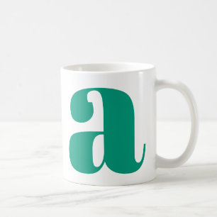 Modernt monogram initialbokstav i smaragdgrönt kaffemugg