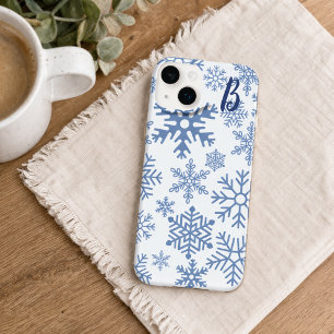 Modernt monogram med blå snöflingor