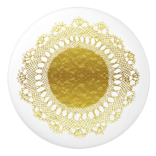 Modernt Victorianguld omkullkastar doilyen för Knopp