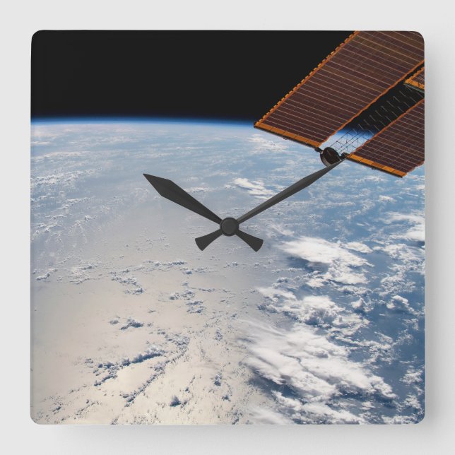 Molnformationer omgivande sollint av Stilla havet Fyrkantig Klocka (Framsida)