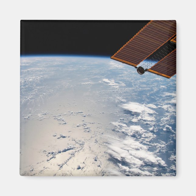 Molnformationer omgivande sollint av Stilla havet Magnet (Framsidan)