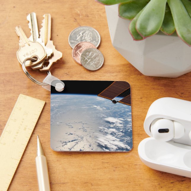 Molnformationer omgivande sollint av Stilla havet Nyckelring (Skrivbord)