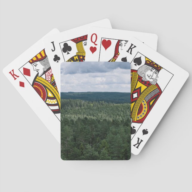 Molnig grön ovanför skogslandskapet foto casinokort (Baksidan)