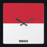 Monaco Flagga Dazzling Patriotic Fyrkantig Klocka<br><div class="desc">Monaco Flagga Dazzling Patriotic Square Wall Clock i färg och inslag i Monaco-flagga som täcker framsidan av klockan. Flagga kompletteras med texten "Monaco" på grund. Anpassadet Text är fullt ut med funktionen "Anpassa den!". Du kan ändra den, ta bort den eller lägga till en egen. Den här charmerande utformningen är...</div>