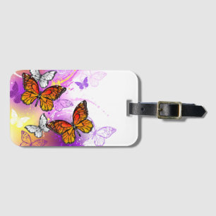 Monarch Butterflies on Lila Background Bagagebricka