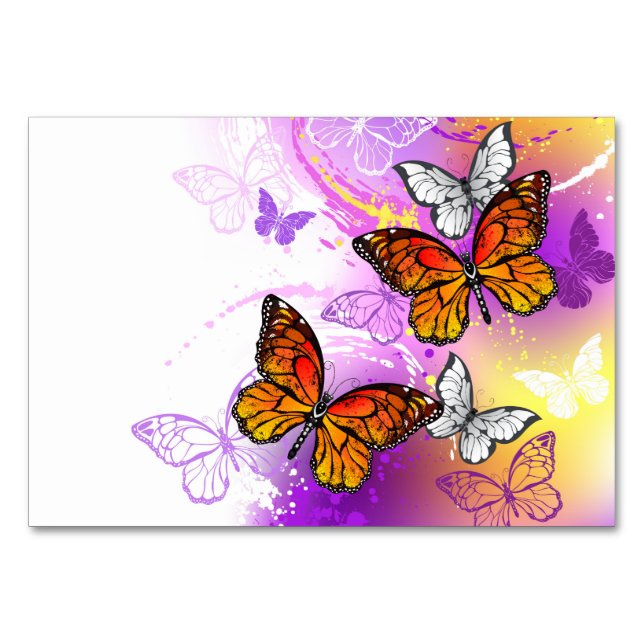Monarch Butterflies on Lila Background Bordsnummer (Framsidan)