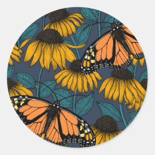 Monarch butterfly on yellow coneflowers runt klistermärke