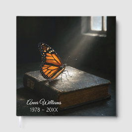 Monarch Butterfly på en Heliga Bible Gästböcker