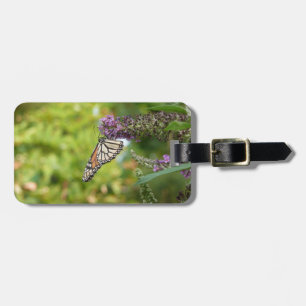 Monarch Butterfly vid Lila Butterfly Bush Bagagebricka