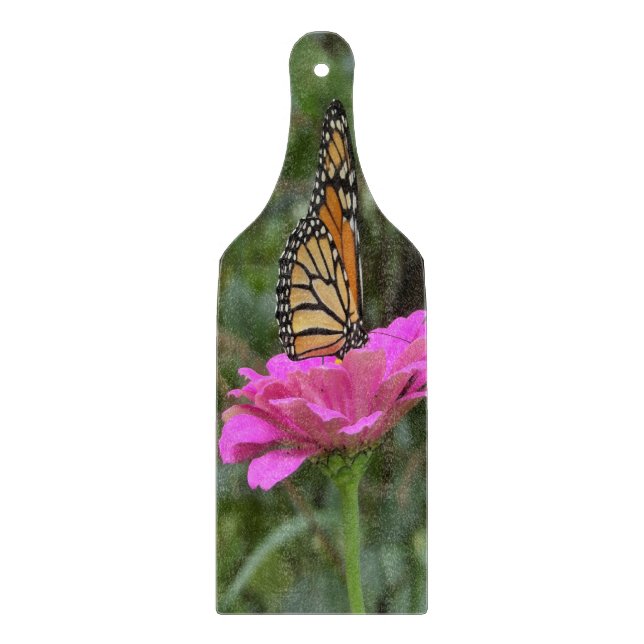 Monarch Butterfly vid Söt Rosa Zinnia Flower (Framsidan)