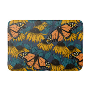 Monarch-fjäril på gulter badrumsmatta