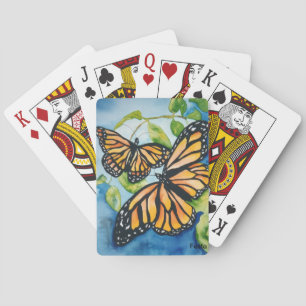 Monarkfjärilar som leker kort spel kort