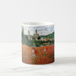 Monet fält av den röda vallmomuggen kaffemugg
