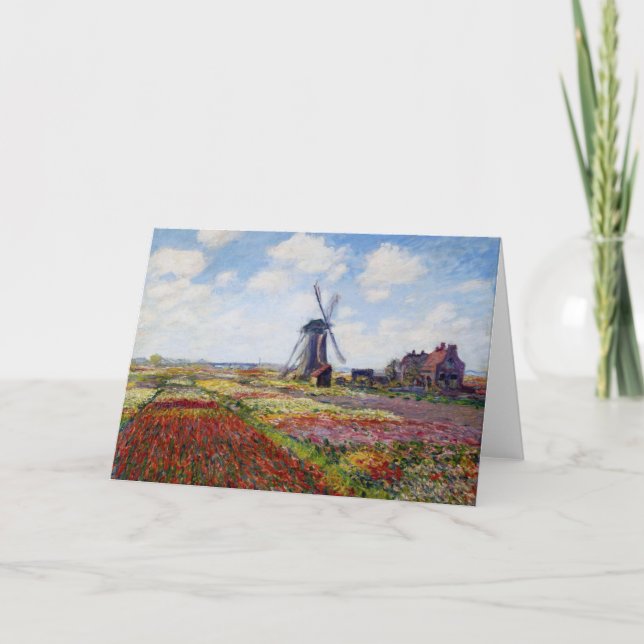 Monet fält av tulpan med kvarnhälsningkortet kort (Framsida)
