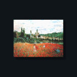 Monet Fält i Röda poppies Canvastryck<br><div class="desc">Monet Fält av Red Poppies canvas wrap. Olja på canvas från 1879. Monet målade flera olika vallmo fält under sin karriär. Den här målningen har flera unga kvinnor i klänningar och solrosor som samlar in de röda blommorna före en flod på en något grumlig sommardag. En söt gåva till fläkt...</div>