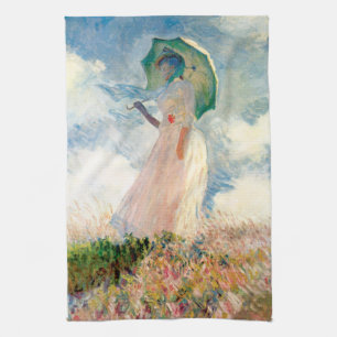 Monet kvinna med en ett slags solskydd kökshandduk