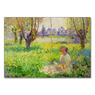 Monet-kvinnan som sitter under den vackra konsten bordsnummer