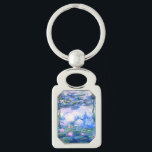 Monet Rosa Vatten Lilies Rektangulärt Silverfärgad Nyckelring<br><div class="desc">En Monet rosa vatten lilies-nyckelkedja med vackra rosa vatten lever flytande i en lugn blå damm med lila dynor. En underbar Monet-gåva till fläkt av imponsionism och Fransk konst. Serenisk naturimponerande med vackra blommor och scenkonst.</div>