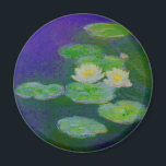Monet Vatten Lilies 1897 Magnet<br><div class="desc">Monet Vatten Lilies magnet. Impressionistisk målning från 1897. Claude Monet målade vatten lilies på ett tvångsmässigt sätt under hela sin karriär. Detta är ett enkelt men färgstarkt exempel på hans arbete. Underbar för fläkt i Monet,  vatten,  imponerande och Fransk.</div>
