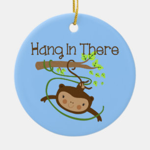 Monkey håller ut där julgransprydnad keramik