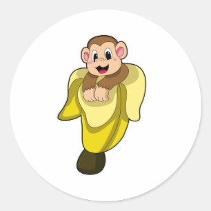 Monkey med bananskal runt klistermärke