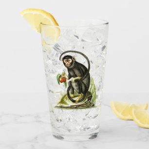 Monkey med frukt glaskopp