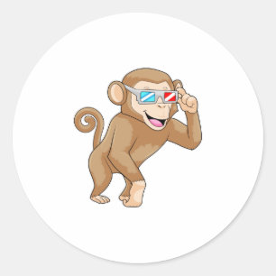 Monkey med glasögon runt klistermärke
