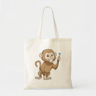 Monkey med tandborste tygkasse