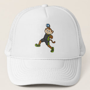 Monkey på Handball-spelare med handboll Keps