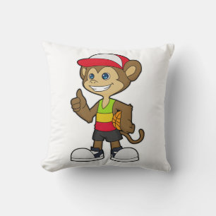 Monkey som basketspelare med basket kudde