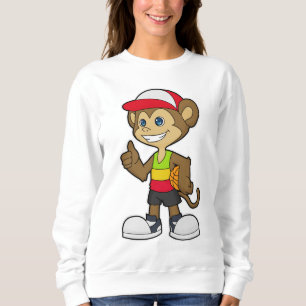 Monkey som basketspelare med basket t shirt