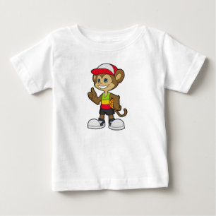 Monkey som basketspelare med basket t shirt